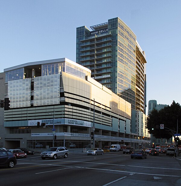 A transit-oriented development of condominiums, a parking garage, above the D line subway station at Wilshire Boulevard and Western Avenue.