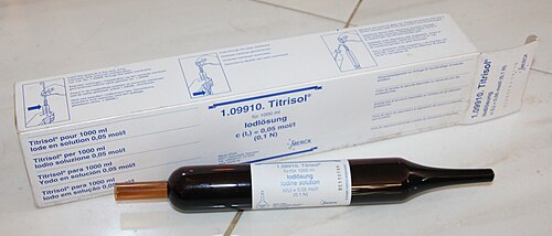 Iodine standard solution, sealed in an ampoule for iodometric analysis. Standard solution of iodine sealed in an ampoule for iodometric analysis.jpg