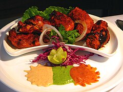 Chicken tikka, a well-known dish across the globe, reflects the amalgamation of South Asian cooking styles with those from Central Asia.