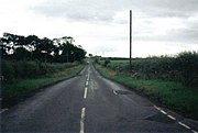 The Lambroughton brae Toll Road looking towards Cunninghamhead, with Mid Lambroughton on the left TollRoad.jpg