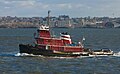 A tug boat is used for towing or pushing another, larger vessel