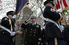 Bucha (2nd from left) at the 2009 New York City Veterans Day parade US Navy 091111-N-6525D-246 Medal of Honor recipient Paul W. Bucha and Cmdr. Curt Jones render honors to the colors during the opening ceremony of the 90th New York City Veterans Day Parade.jpg