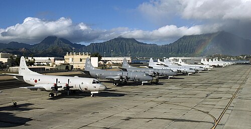 P-3C Orions of the U.S. Navy and partner nations on the tarmac at MCAS Kaneohe Bay during RIMPAC 2010 US Navy 100706-N-6855K-063 P-3C Orion aircraft from the navies of the Japan Maritime Self-Defense Force, Canada, Australia, Republic of Korean and the U.S. line the Rainbow Fleet tarmac of Marine Corps Air Station Kaneohe Bay.jpg