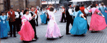 Folk dancers in traditional costume doing Volkspele while on tour in Europe Volkspele003.gif