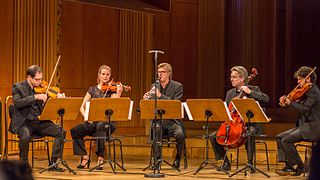 Day 2: "Da Capo - von Damaskus nach Köln". Members of the "WDR Funkhausorchester" playing with Syrian refugees