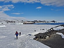 Heritage Adventurer seen from the route to Shackleton's Hut at Cape Royds Walking up to Shackleton's Hut at Cape Royds.jpg
