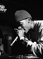 Wiz Khalifa (pictured) earned his second number-one single with "See You Again". It spent 12 weeks at number-one, tying with "Lose Yourself" and "Boom Boom Pow" as the longest-leading rap single. Wiz Khalifa SXSW 2010.jpg