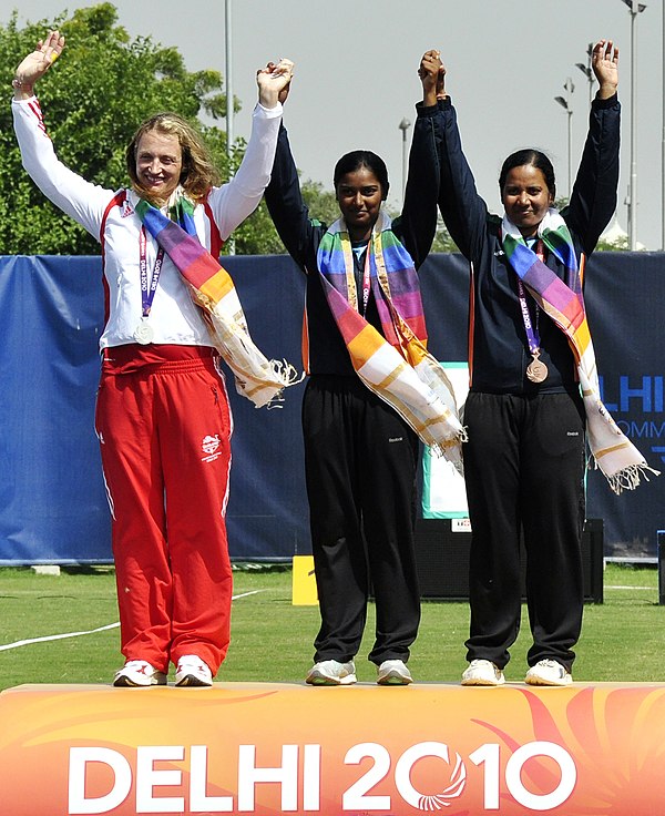 Williamson (left) during the medal ceremony for the women's individual recurve event at the 2010 Commonwealth Games