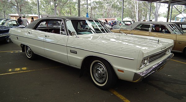 1969 Dodge DE Phoenix 400 pillarless hardtop coupe. The lack of a B-pillar and window frames, added vinyl roof, thickened C-pillar, and softened roofl