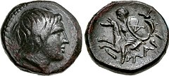 Head of Achilles depicted on a 4th-century BC coin from Kremaste, Phthia. Reverse: Thetis, wearing and holding the shield of Achilles with his AX monogram.