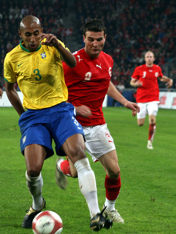 Frei battling for the ball with Brazil's Luisão in a November 2006 friendly