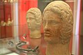 Archaeological finds from Narce at the MAVNA Museum (votive offerings from the Monte Li Santi - Le Rote cult place - heads and iron key) 01.jpg