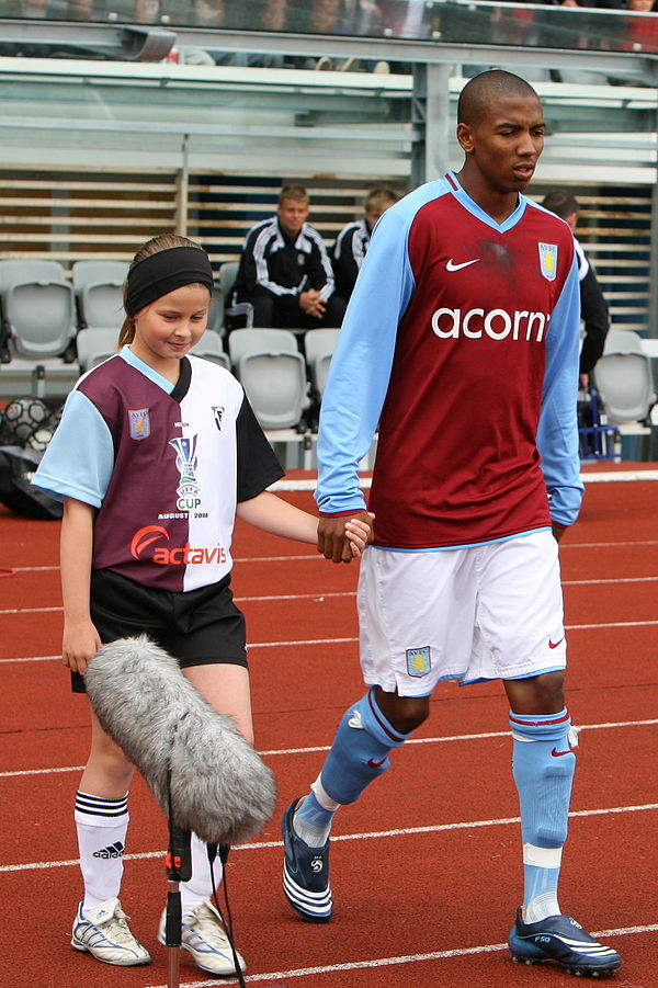 Young (right) with Aston Villa in 2008