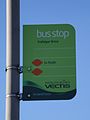 The bus stop flag at Trafalgar Drive, Binstead, Isle of Wight. At the time of photographing it served Southern Vectis' Binstead and Haylands shuttle service until it was replaced by regular route 37 on 18 April 2010. The old number 4 has been taken off and the sticker for what was route 29 also removed.