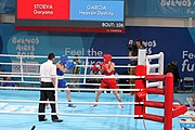 Deutsch: Boxen bei den Olympischen Jugendspielen 2018 Tag 12, 18. Oktober 2018 - Kampf um die Bronzemedaille im Fliegengewicht Mädchen – Heaven Destiny Garcia (USA, blau) schlägt Goryanana Stoeva (Bulgarien, rot) 5-0; Ringrichter ist Ishanguly Meretnyyazov (Turkmenistan). English: Boxing at the 2018 Summer Youth Olympics on 18 October 2018 – Girl's flyweight Bronze Medal Bout - Heaven Destiny Garcia (USA, blue) beats Goryanana Stoeva (Bulgaria, red) 5-0; Referee is Ishanguly Meretnyyazov (Turkmenistan). Español: Boxeo en los Juegos Olímpicos Juveniles de Verano de 2018 en 18 de octubre de 2018 - Combate a medalla de bronce de peso mosca para mujeres: Heaven Destiny Garcia (Estados Unidos, azul) le gana a Goryanana Stoeva (Bulgaria, roja) 5-0; El árbitro es Ishanguly Meretnyyazov (Turkmenistán).