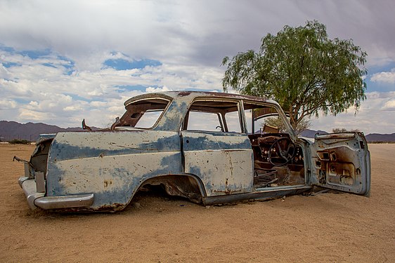 Abandoned Car - Photo taken in october 2015. On the roads that cross Namibia, it is common to encounter carcasses of abandoned cars that have suffered accidents due to the holes, stones or sudden accumulations of sand from the desert