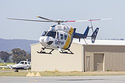 Careflight (VH-IME) Kawasaki Heavy Industries BK117 B-2 in decollo dall'aeroporto di Wagga Wagga (1).jpg