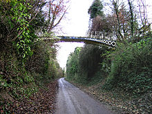 Cast Iron Footbridge over Micheldever Road, Andover. Built 1851 by Tasker and Fowle to carry Ladies Walk footpath over Micheldever Road Cast Iron Footbridge over Micheldever Road, Andover. - geograph.org.uk - 90925.jpg