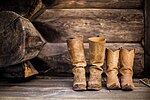 Cowboy shoes in a cabin (Unsplash).jpg