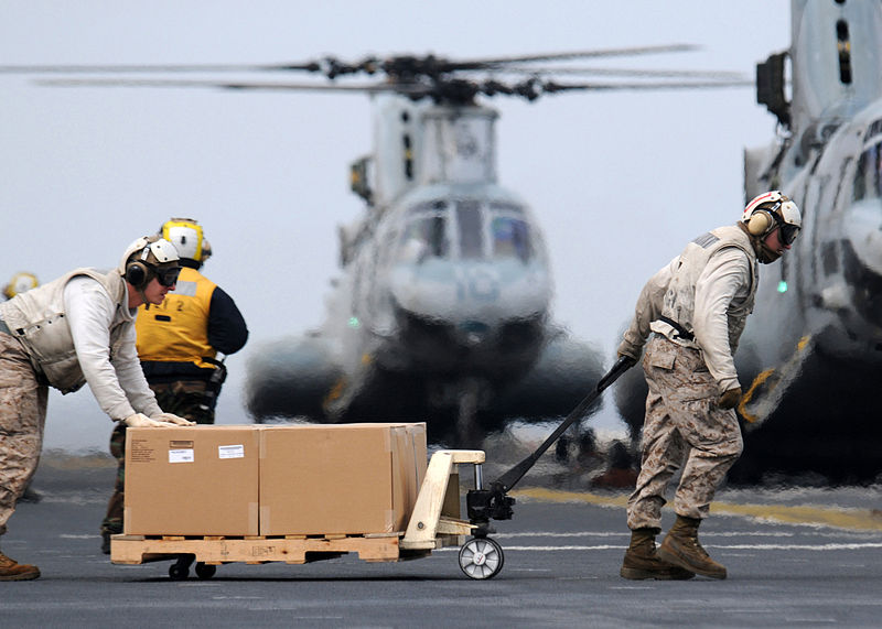 File:Defense.gov News Photo 110321-N-SO729-408 - U.S. Marines move humanitarian and disaster relief supplies to load them into a Marine Corps CH-46E Sea Knight helicopter on the flight deck of the.jpg