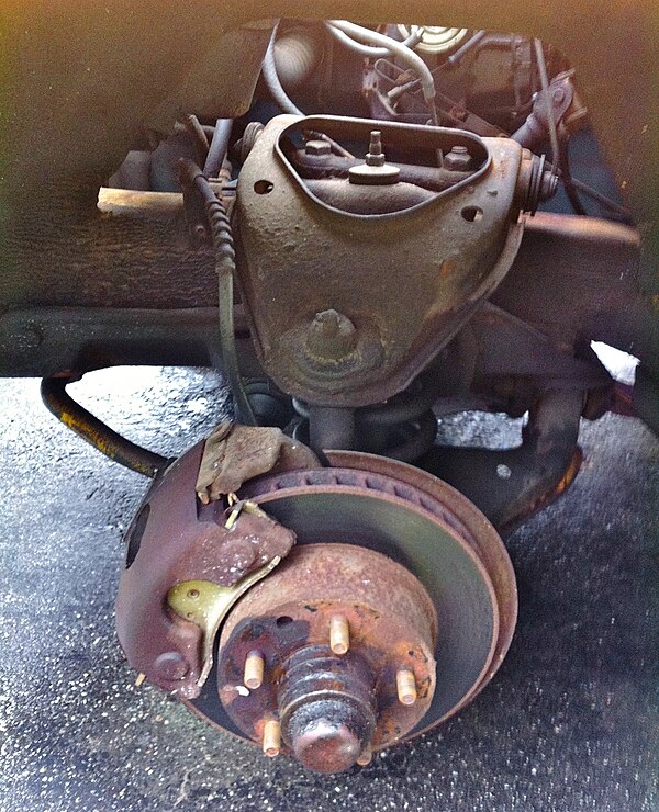 Front suspension and brake system on AMC Pacer with the rectangular open slots visible between the disc's friction surfaces