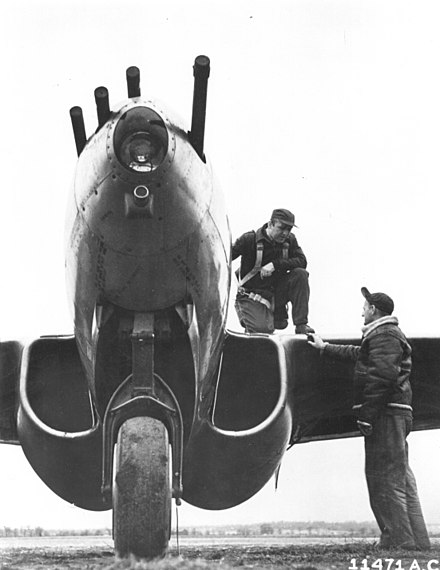 Details of fuselage and undercarriage of a P-59B, showing the nose armament