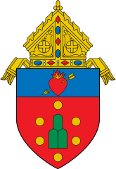 The original coat of arms as designed by Bishop Mariano Madriaga
