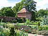 The dovecote and herb beds