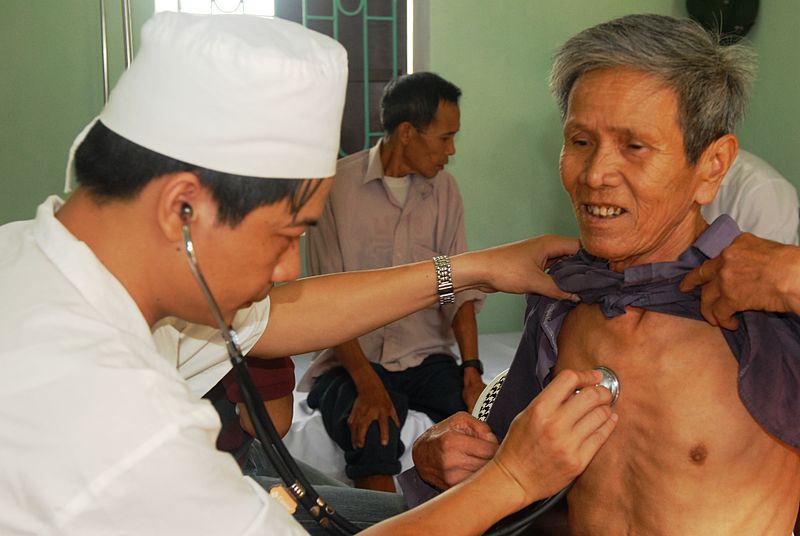 File:Elderly vietnamese man gets examined.jpg