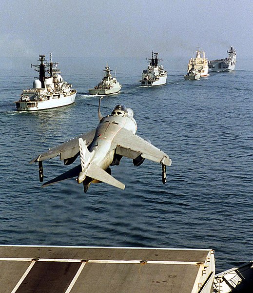 A Sea Harrier launches from the flight deck of HMS Illustrious in 2001