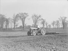 A cultivator pulled by a tractor in Canada in 1943 Farm. Tractor - Farm, Ville LaSalle BAnQ P48S1P08968.jpg