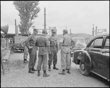 Brigadier General Osborne seen with General Maxwell Taylor at Freedom Village, South Korea in 1953. General Maxwell Taylor and Brigadier General Ralph M. Osborne, CO. are shown in conference as they arrive for an... - NARA - 542269.tif