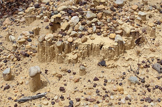 Small stones over sand columns in Serra da Capivara National Park, Brazil.