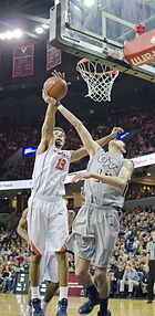 Gill blocking a shot in November 2014 George Washington vs UVA DSC 5992 (15233403623).jpg