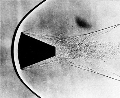 Shadowgraph of the reentry shock wave simulated in a wind tunnel, 1957