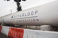 A long white tube about 10 feet in diameter, part of the Hyperloop Pod Competition, sponsored by SpaceX