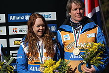 Jade Etherington and guide John Clarke receive bronze medals for the super-G at the 2013 IPC Alpine World Championships in La Molina Jade Etherington Bronze medal Super G.JPG