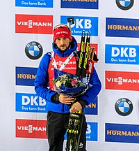 Jakov Fak on the winner's podium in Östersund (2017)