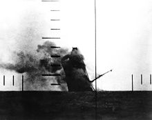 Periscope photo of a Japanese merchant ship sinking. Japanese Cargo Ship Sinking.jpg