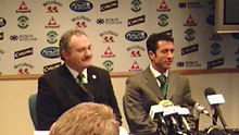 John Collins is introduced as the new Hibs manager by Hibs chairman Rod Petrie at a news conference on 31 October 2006 John Collins Hibs.jpg