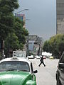 View of Juarez Street in the Centro of Mexico City. The Monument to the Mexican Revolution can be seen in the background.