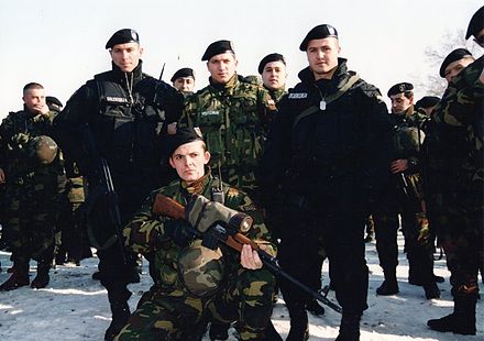 Macedonian special policeman holding a Zastava M76.