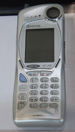 The Kyocera VP-210 Visual Phone was the first commercial mobile videophone. The Personal Handy-phone System (PHS) phone was introduced in Japan (1999). Kyocera VP-210 CP+ 2011.jpg