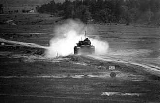 An M60 of the 1-632 Armor firing on a tank range at Fort McCoy, 1990 M60 of 1st Battalion, 632nd Armor firing on tank range June 1990 DA-SN-91-03902.jpg