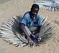 Man_weaving_basket