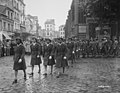 Members of the 6888th Central Postal Directory Battalion take part in a parade ceremony in honor of Joan d'Arc.jpg