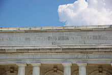 Detail of the inscription over the rear entrance to the Arlington Memorial Amphitheater. The inscription reads: "Dulce et decorum est pro patria mori", written by the Roman poet Horace. Memorial Amphitheater - rear pediment - Arlington National Cemetery - 2011.JPG