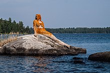 Mermaid sculpture on Rainy Lake[15]