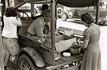 A Mexican lunch wagon serving tortillas and refried beans to workers at a pecan shelling plant Mexican lunch wagon serving tortillas and fried beans to workers in pecan shelling plant - DPLA - 580feee334a68d5a4b1bc8d60a8e9f93.jpg