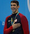 English: United States. Michael Phelps, competitive swimmer and the most successful and most decorated Olympian of all time. Русский: США. Майкл Фелпс, пловец, многократный обладатель наград.